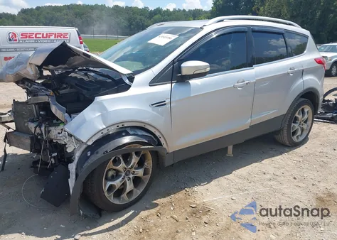 2016 Ford Escape Titanium z USA, uszkodzony, nr VIN 1FMCU0J94GUC74363